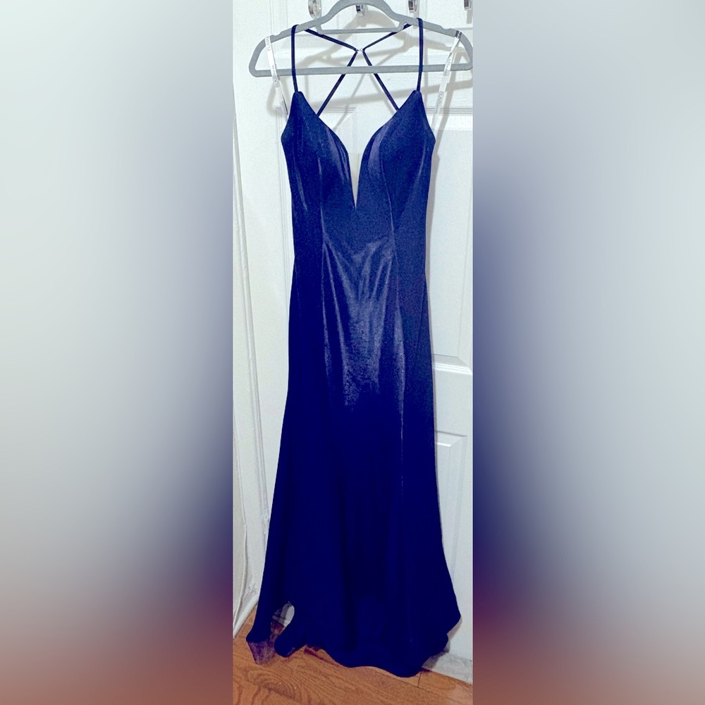 Navy Evening Gown by Flair size 8 with small train, slight damage to lining